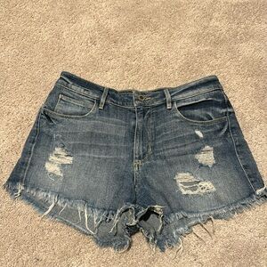 Distressed denim shorts